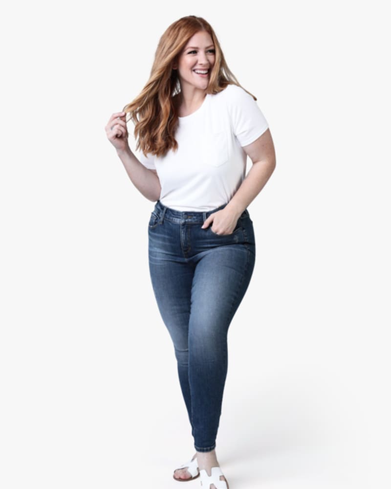 Front of a model wearing a size 12 Gianna Mid-Rise Skinny Jean in LAYLA by Slink Jeans. | dia_product_style_image_id:256074